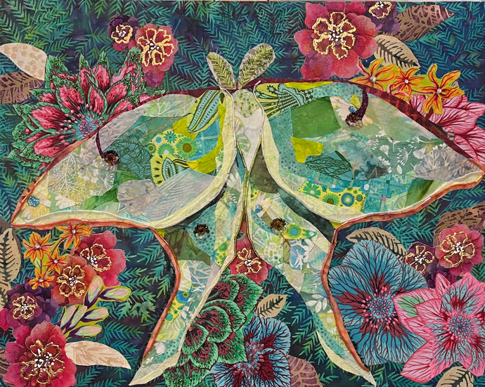 Floral artwork made with layered fabric and mixed media, featuring blooming forms in soft cream and muted blue tones with textured layered flower details