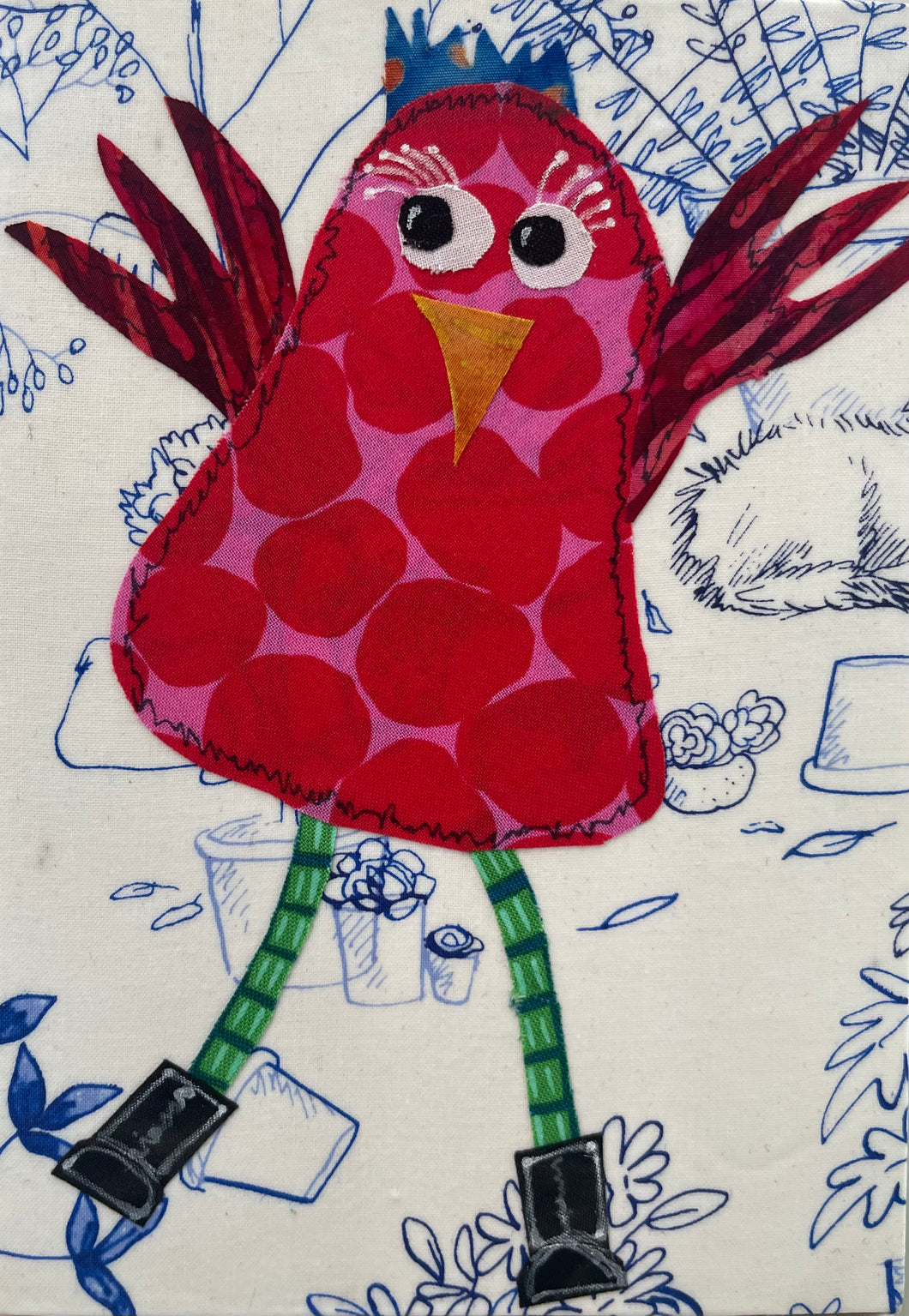 Whimsical red fabric collage bird with raised wings, green legs, and black boots on a softly illustrated background