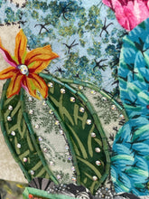 Close detail of Swarovski crystal bloom and Czech glass bead ridge work on Canyon Bloom by Robyn Moore Arts, crimson coral fabric bloom above silver bead-edged cactus pads