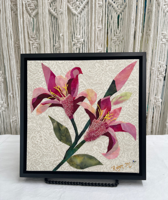 Fabric flower artwork with two soft pink and burgundy blossoms on 8x8 panel with layered textiles, Czech beads and green stems