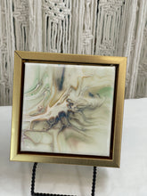 Tidal Veil resin artwork with soft iridescent pearl, gold, blue, and blush pigments creating flowing abstract movement and luminous depth.