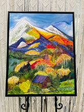 Original acrylic and fabric mixed media mountain landscape painting 24x30 inches, twin snow capped peaks, layered fabric hills in violet orange and gold, fiery autumn trees with white linework, stone cottage in green meadow, gallery wrapped canvas, part of the Where Color Takes Root Collection by Robyn Moore Arts