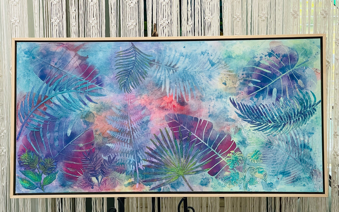 Original large format botanical acrylic painting 24x48 inches, ethereal wash of periwinkle blue lavender coral and peach with tropical leaf silhouettes in teal violet and magenta created through stenciling and nature printing over real leaves, beach sand and texture paste surface detail, gallery wrapped canvas, part of the Where Color Takes Root Collection by Robyn Moore Arts