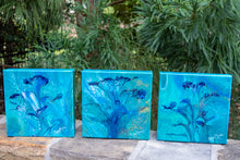 abstract fluid acrylic painting with vibrant blue green colors and flower