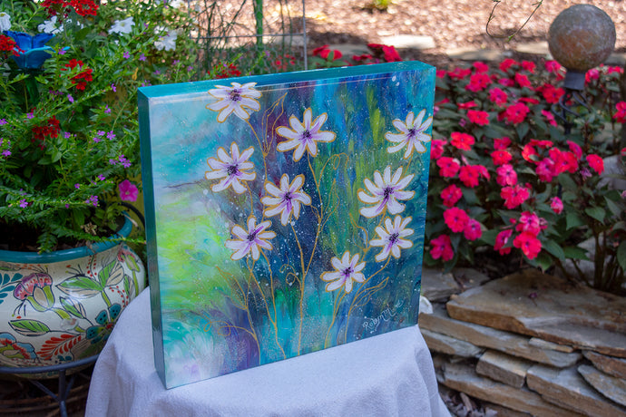 abstract fluid acrylic white daisy painting with texture and vibrant blue colors