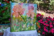 multi layered mixed media textured flower garden of peonies and wildflowers with sky and grass